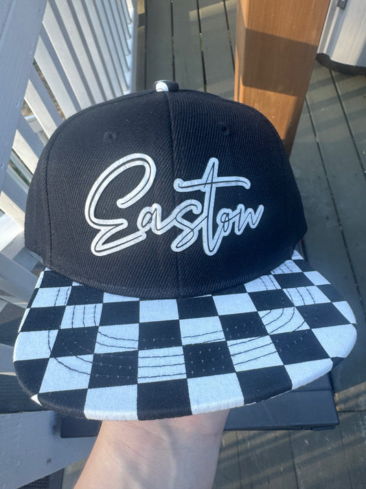 Cut out name on checkered